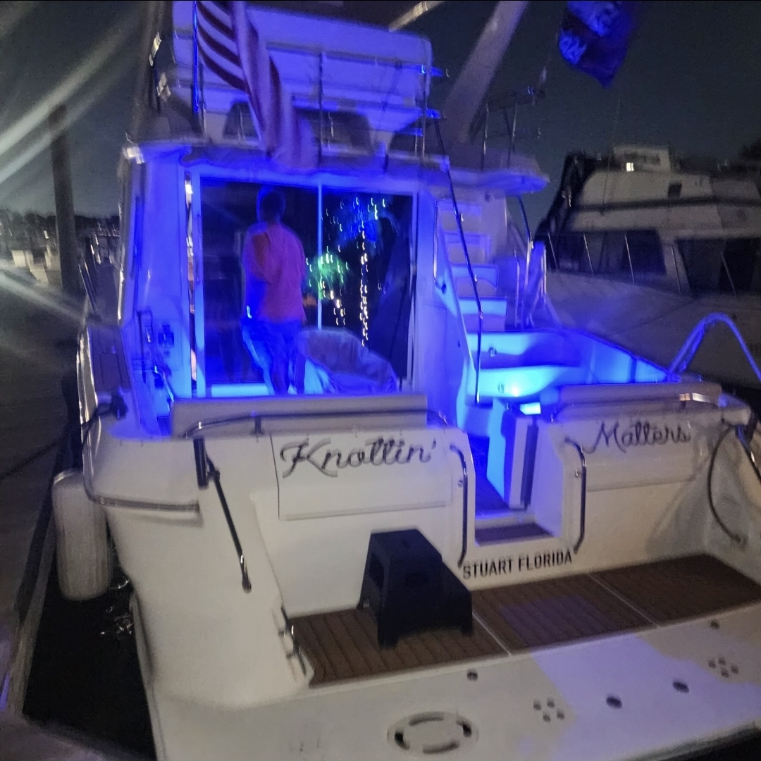 The aft deck of Sea Ya Later glowing at night